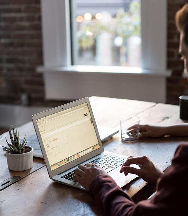 Person typing on a laptop