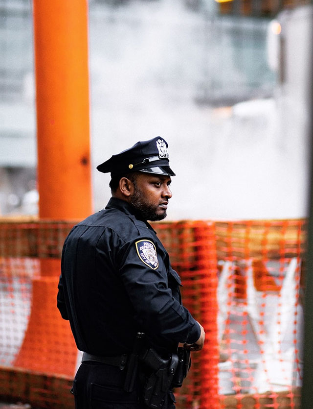Police officer glancing over his shoulder