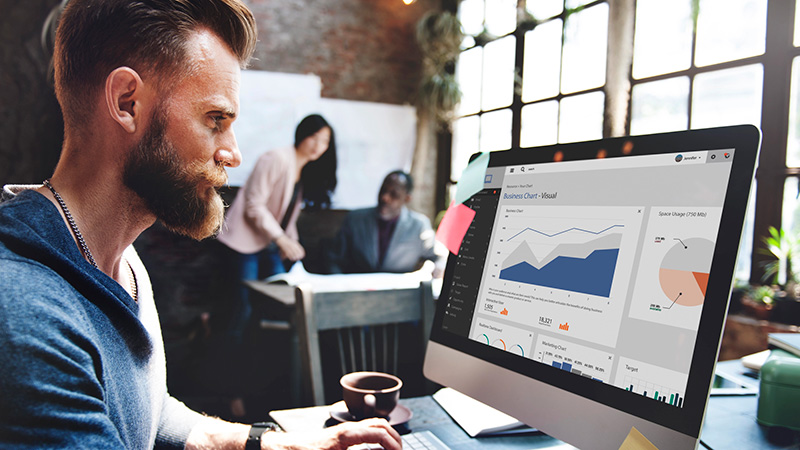 Man working at a desktop computer