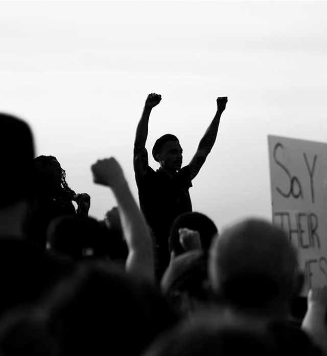 Protested at a rally with raised arms